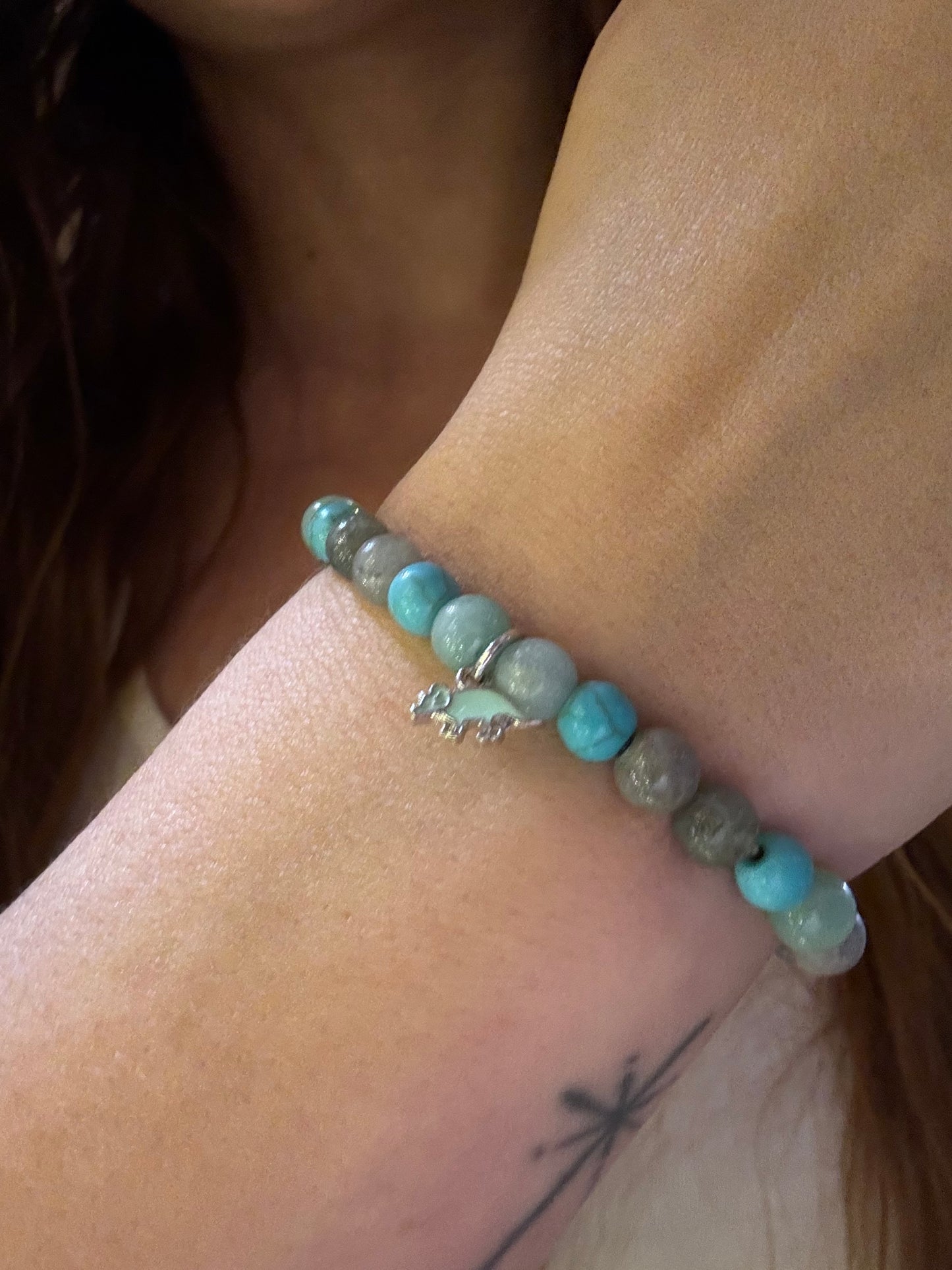 Teal triceratops mala bracelet