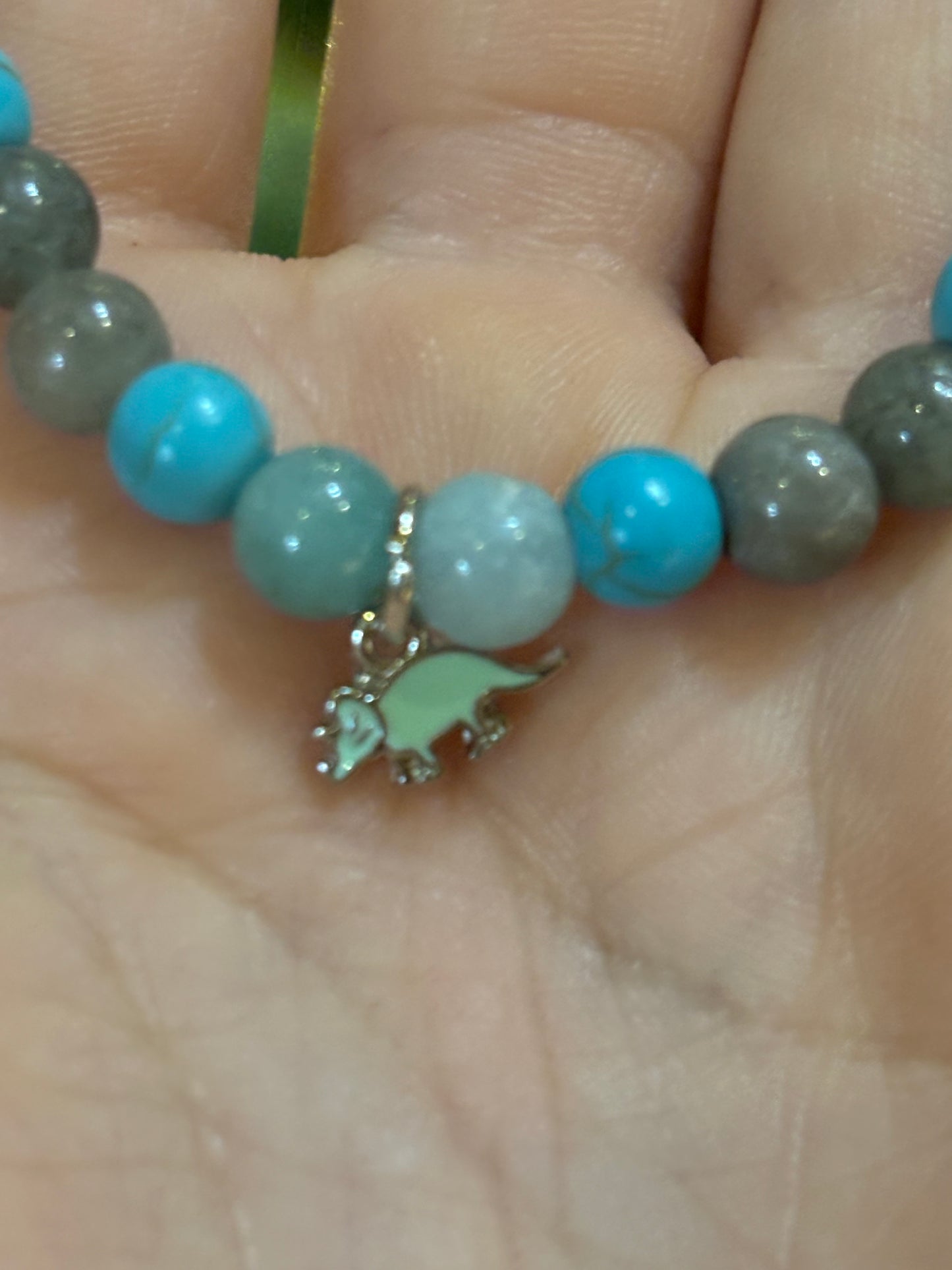 Teal triceratops mala bracelet