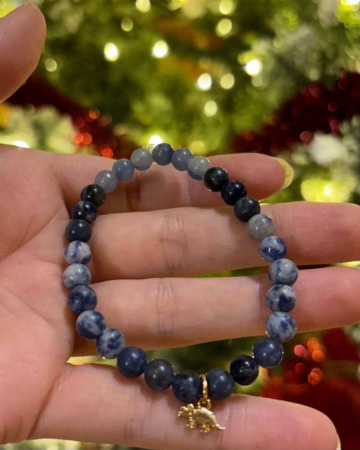 Blue triceratops mala bracelet