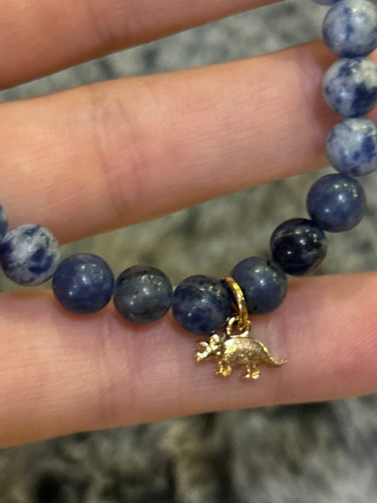 Blue triceratops mala bracelet