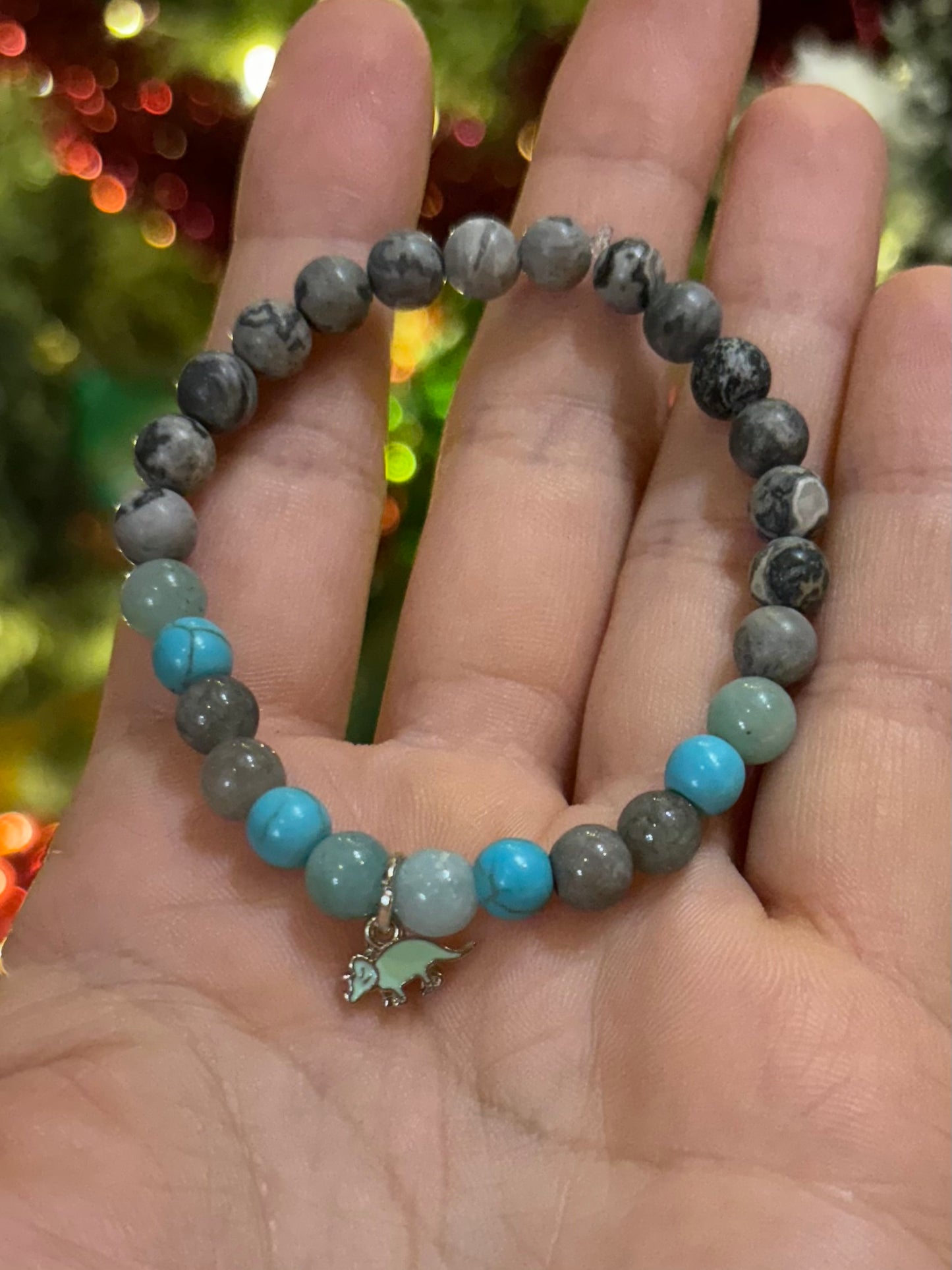 Teal triceratops mala bracelet