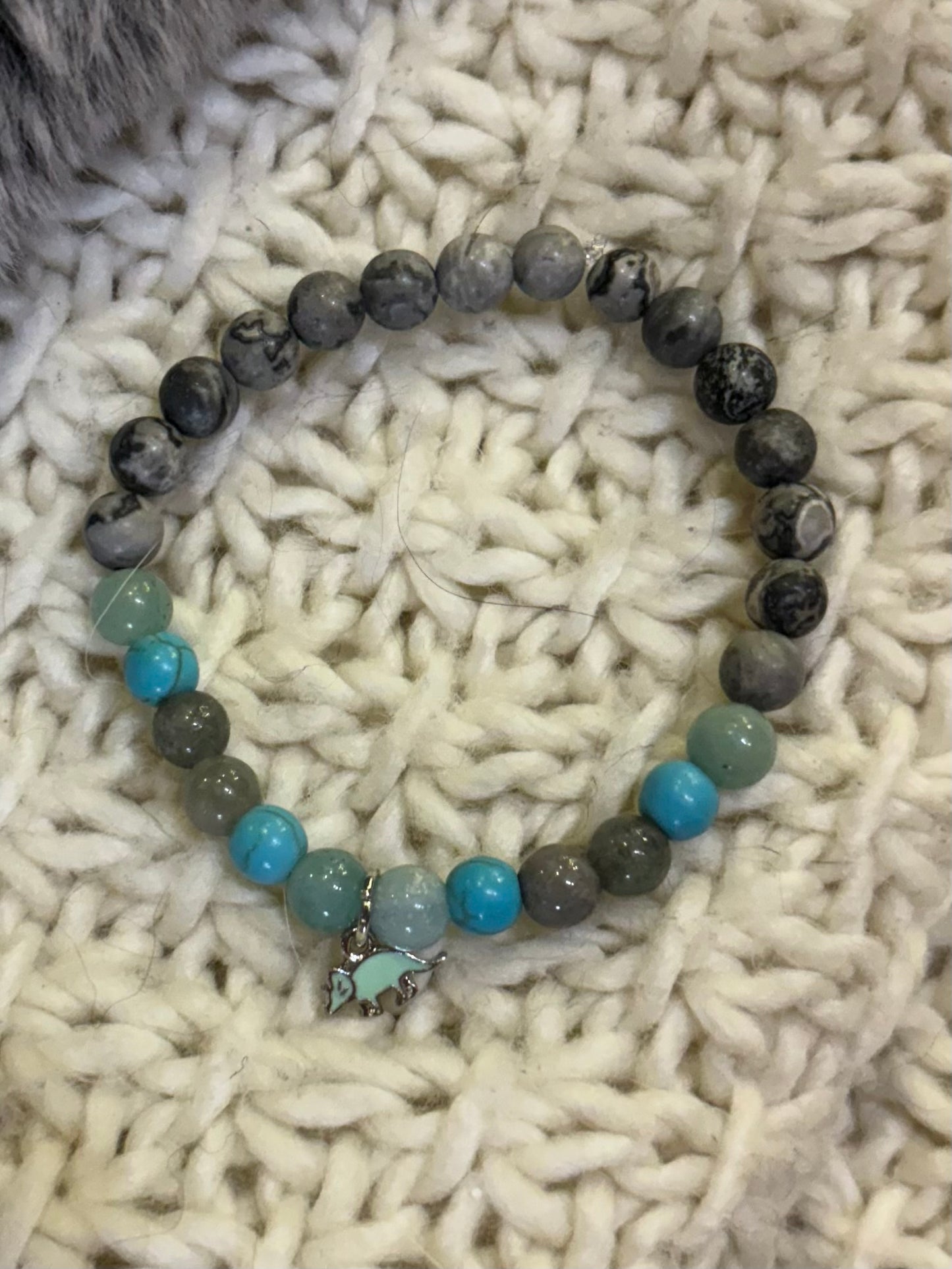 Teal triceratops mala bracelet